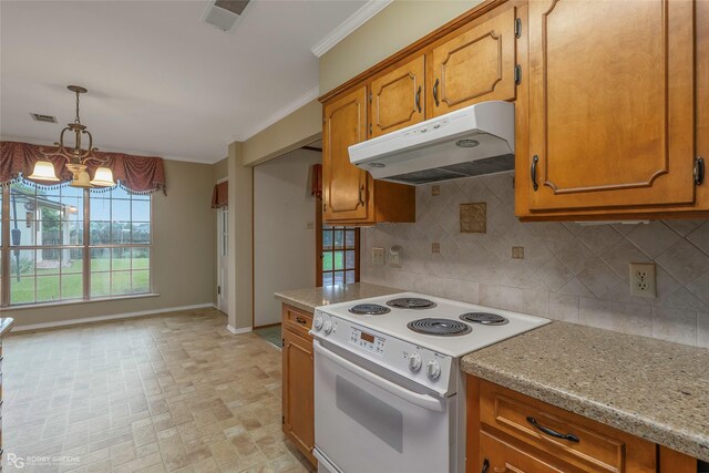 189 India Dr, Shreveport, LA 71115 - kitchen with electric stove, under cabinet range hood, brown cabinetry, a chandelier, and tasteful backsplash