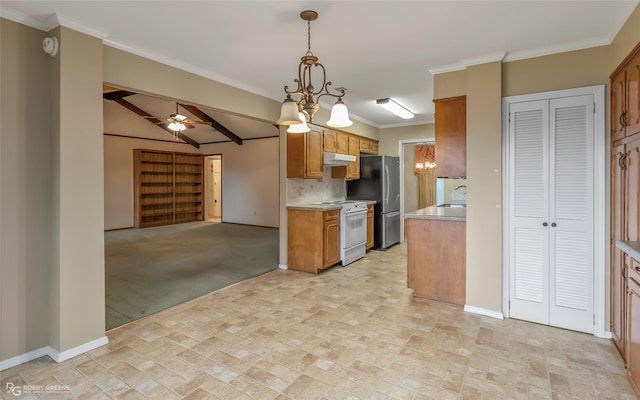 189 India Dr, Shreveport, LA 71115 - kitchen with white range oven, brown cabinets, freestanding refrigerator, a chandelier, and light countertops