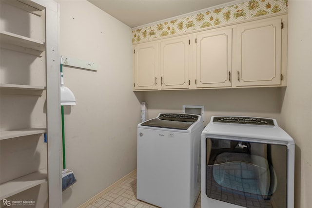 189 India Dr, Shreveport, LA 71115 - laundry area featuring washer and clothes dryer and cabinet space
