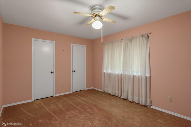 189 India Dr, Shreveport, LA 71115 - unfurnished bedroom featuring carpet flooring and a ceiling fan