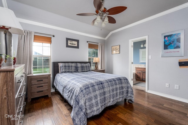 217 Sugarloaf Ave, Abilene, TX 79602 - bedroom featuring ornamental molding, dark wood-style flooring, multiple windows, and ensuite bathroom