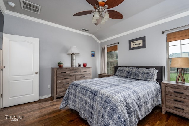 217 Sugarloaf Ave, Abilene, TX 79602 - bedroom with crown molding, dark wood-style floors, and ceiling fan
