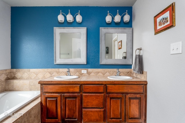 217 Sugarloaf Ave, Abilene, TX 79602 - full bathroom featuring double vanity and a bath