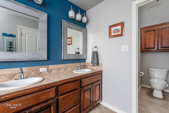 217 Sugarloaf Ave, Abilene, TX 79602 - full bathroom with tile patterned floors and double vanity