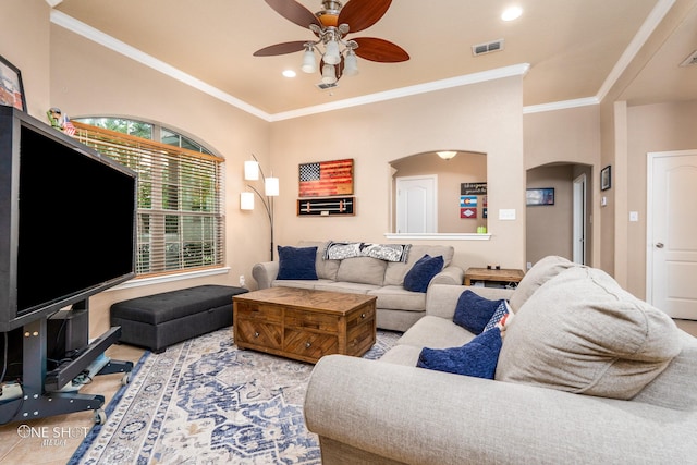 217 Sugarloaf Ave, Abilene, TX 79602 - living room with arched walkways, ceiling fan, crown molding, and recessed lighting