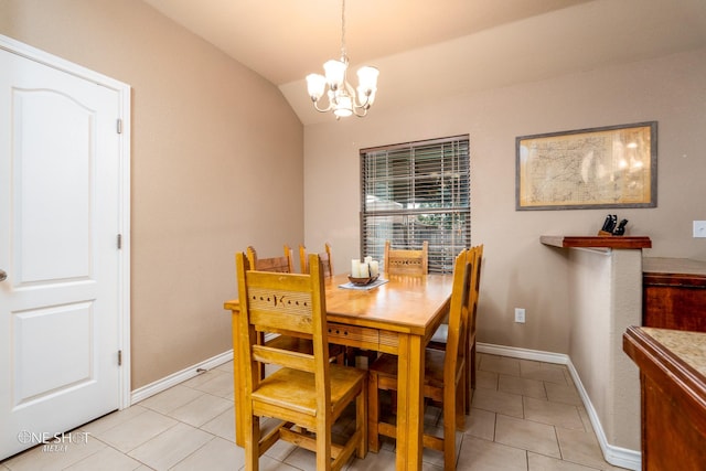 217 Sugarloaf Ave, Abilene, TX 79602 - dining area featuring a chandelier, light tile patterned floors, and vaulted ceiling
