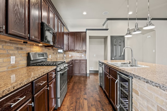 682 Cannon Dr, Fate, TX 75087 - kitchen with appliances with stainless steel finishes, wine cooler, dark wood-type flooring, dark brown cabinetry, and backsplash