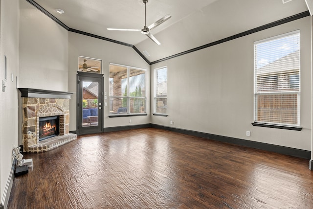 682 Cannon Dr, Fate, TX 75087 - unfurnished living room featuring a ceiling fan, ornamental molding, wood finished floors, a fireplace, and lofted ceiling