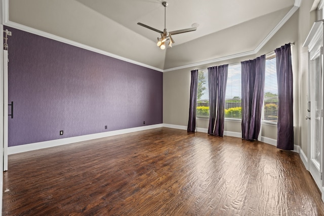 682 Cannon Dr, Fate, TX 75087 - empty room with an accent wall, ceiling fan, wood finished floors, and a raised ceiling
