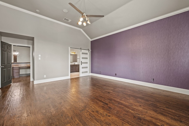682 Cannon Dr, Fate, TX 75087 - unfurnished room featuring ceiling fan, a barn door, ornamental molding, vaulted ceiling, and wood finished floors