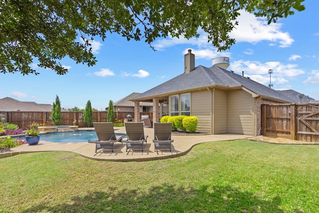 682 Cannon Dr, Fate, TX 75087 - fenced backyard with a patio and a pool with connected hot tub