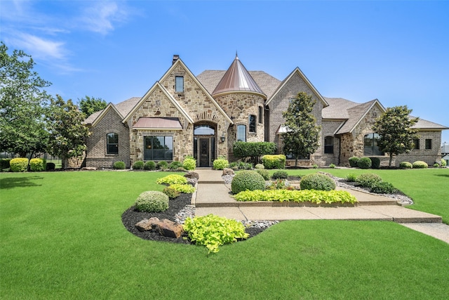 109 Old Vineyard Ln, Heath, TX 75032 - french provincial home with a front yard, stone siding, a standing seam roof, and a metal roof