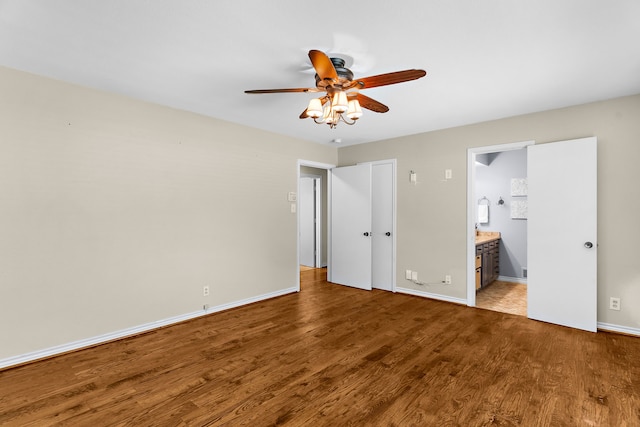 206 S Field St, Prosper, TX 75078 - unfurnished bedroom with wood finished floors, ensuite bath, and ceiling fan