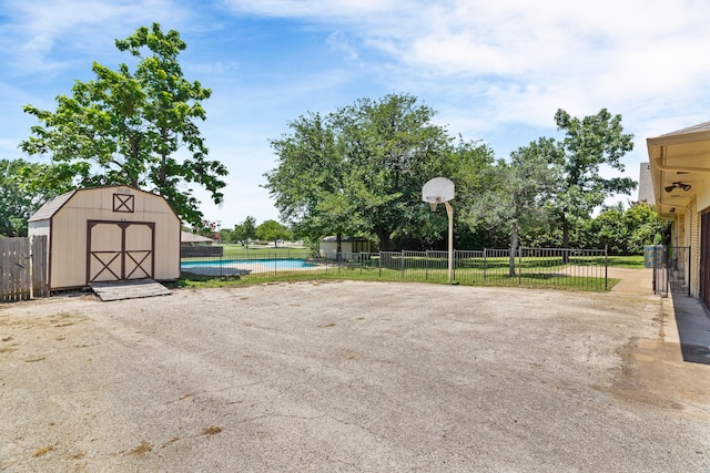 206 S Field St, Prosper, TX 75078 - view of yard featuring a shed