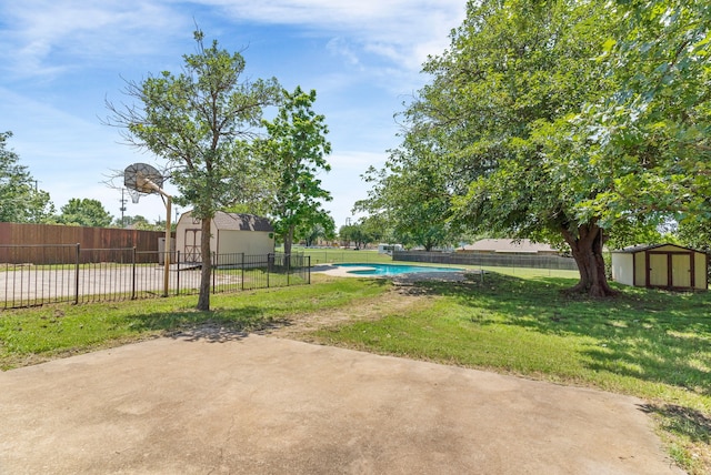 206 S Field St, Prosper, TX 75078 - fenced backyard featuring a shed and a patio