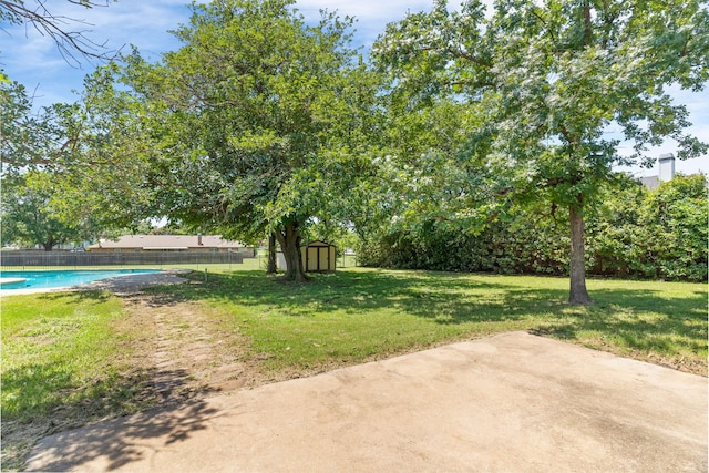 206 S Field St, Prosper, TX 75078 - fenced backyard featuring a shed and a patio