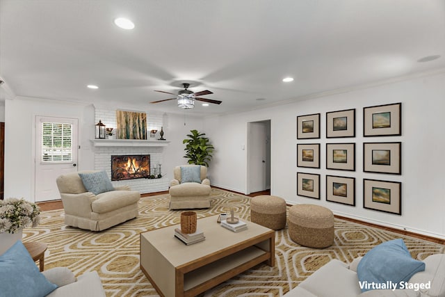 206 S Field St, Prosper, TX 75078 - living area with recessed lighting, ceiling fan, crown molding, and a brick fireplace