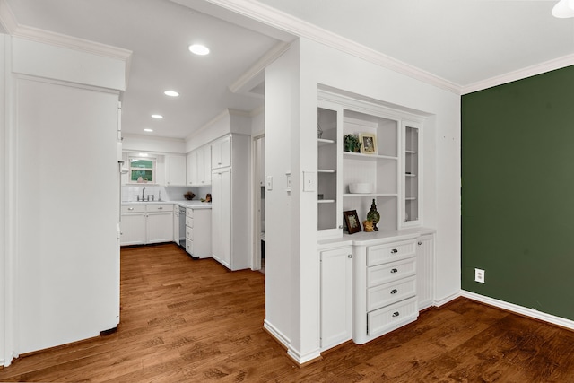 206 S Field St, Prosper, TX 75078 - kitchen with crown molding, wood finished floors, recessed lighting, dishwasher, and light countertops