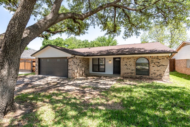 1828 Tracey Cir, Irving, TX 75060 - ranch-style house featuring brick siding, an attached garage, driveway, and roof with shingles