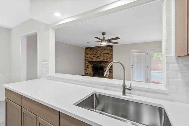 1828 Tracey Cir, Irving, TX 75060 - kitchen with light countertops, ceiling fan, a brick fireplace, and open floor plan