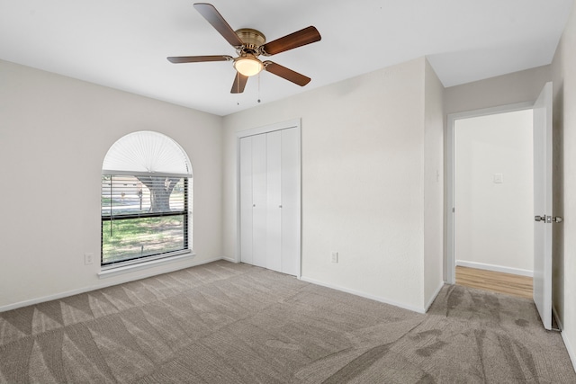 1828 Tracey Cir, Irving, TX 75060 - unfurnished bedroom featuring carpet, a closet, and ceiling fan