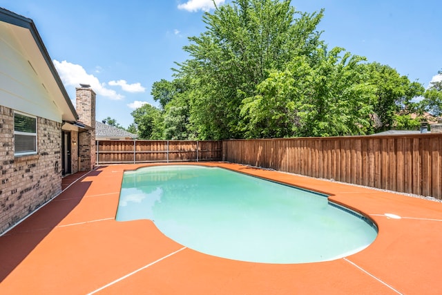 1828 Tracey Cir, Irving, TX 75060 - view of pool with a fenced backyard and a patio