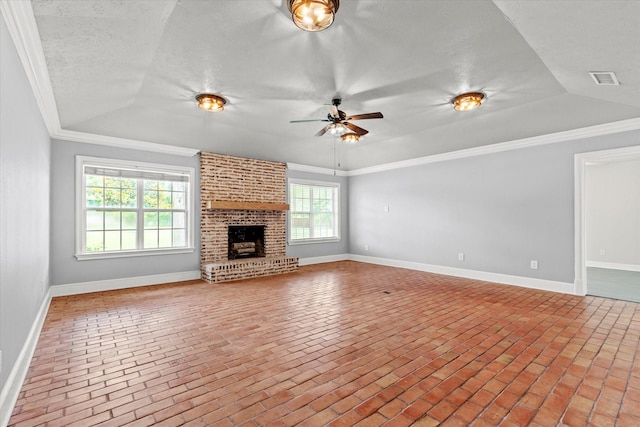 119 Locust Ct, Oak Leaf, TX 75154 - unfurnished living room with a ceiling fan, brick floors, ornamental molding, a brick fireplace, and vaulted ceiling
