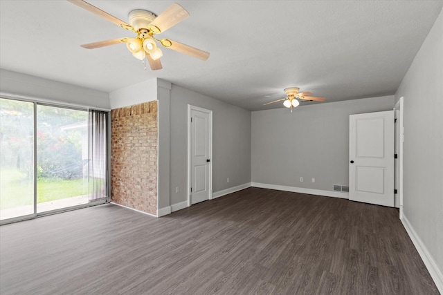 119 Locust Ct, Oak Leaf, TX 75154 - spare room featuring a ceiling fan and dark wood-type flooring