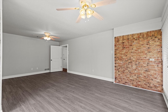 119 Locust Ct, Oak Leaf, TX 75154 - empty room with a ceiling fan, dark wood-type flooring, and brick wall