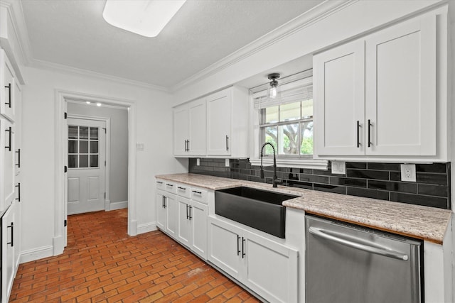 119 Locust Ct, Oak Leaf, TX 75154 - kitchen featuring dishwasher, brick flooring, crown molding, decorative backsplash, and white cabinets