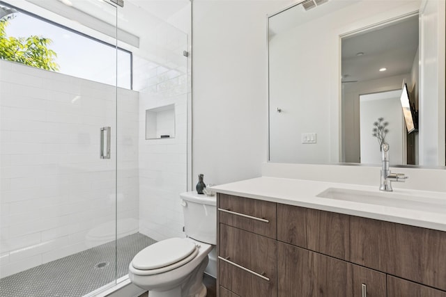 4726 Manett St Unit 101, Dallas, TX 75204 - bathroom featuring vanity, a shower stall, and recessed lighting
