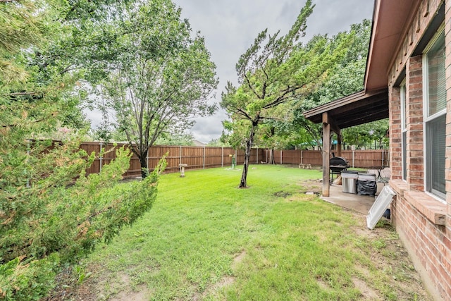 101 Goldenrain Dr, Wylie, TX 75098 - fenced backyard with a patio area