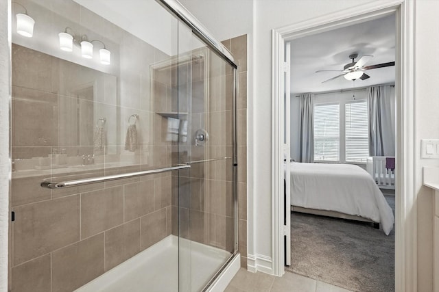 1213 Bonsmara Dr, Northlake, TX 76247 - bathroom with connected bathroom, a shower stall, tile patterned floors, and ceiling fan