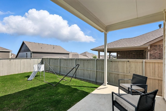 1213 Bonsmara Dr, Northlake, TX 76247 - fenced backyard with a patio area and a playground