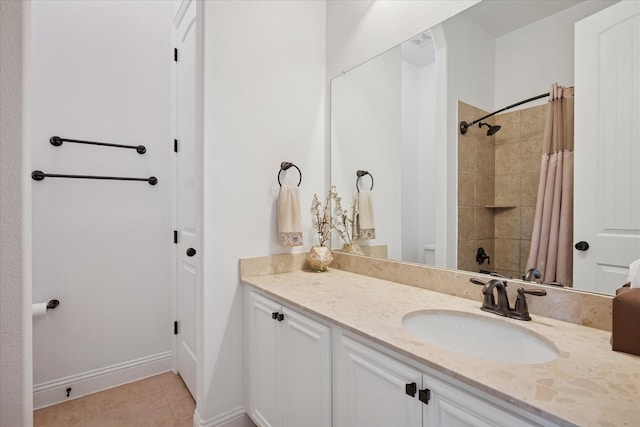 5704 Ridgeson Dr, Mckinney, TX 75071 - full bath with curtained shower, vanity, and tile patterned flooring
