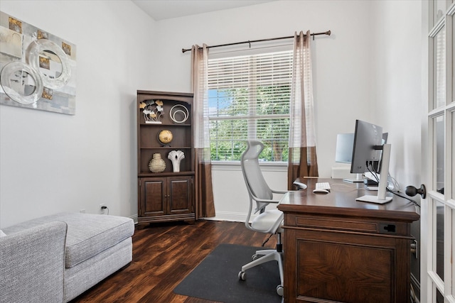 5704 Ridgeson Dr, Mckinney, TX 75071 - home office featuring dark wood-style flooring and baseboards