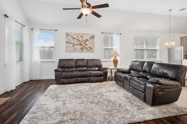 5704 Ridgeson Dr, Mckinney, TX 75071 - living room with vaulted ceiling, a chandelier, a ceiling fan, and wood finished floors