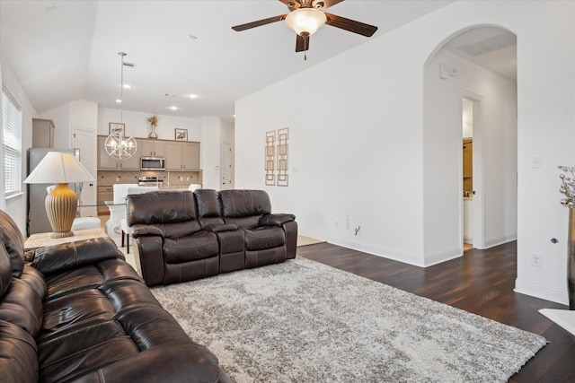 5704 Ridgeson Dr, Mckinney, TX 75071 - living room featuring a ceiling fan, arched walkways, dark wood finished floors, vaulted ceiling, and recessed lighting