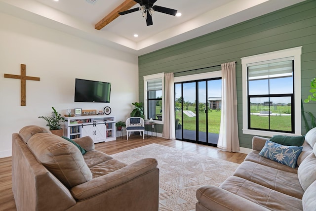 176 Private Road 33082, Sumner, TX 75486 - living area featuring a ceiling fan, light wood-style floors, wooden walls, recessed lighting, and a high ceiling