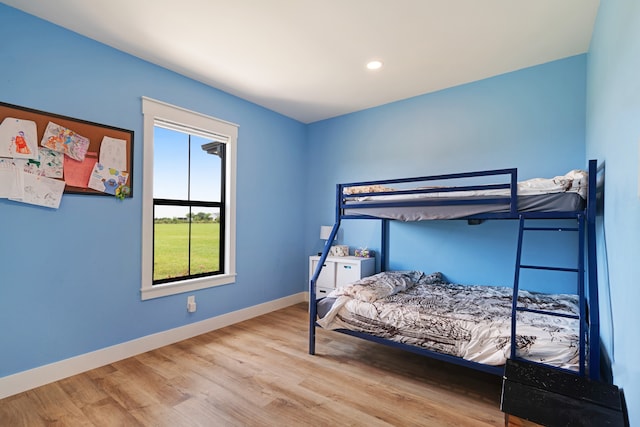 176 Private Road 33082, Sumner, TX 75486 - bedroom with wood finished floors and recessed lighting