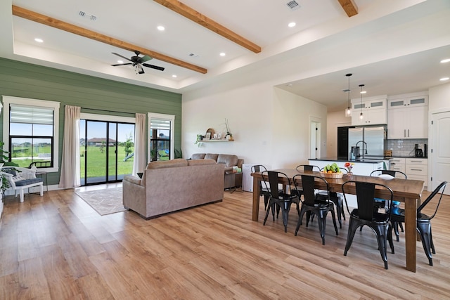 176 Private Road 33082, Sumner, TX 75486 - dining area featuring a ceiling fan, light wood-style flooring, beam ceiling, and recessed lighting