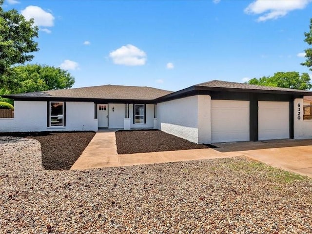 6320 Lavano Dr, Edgecliff Village, TX 76134 - ranch-style home featuring a garage, concrete driveway, and stucco siding