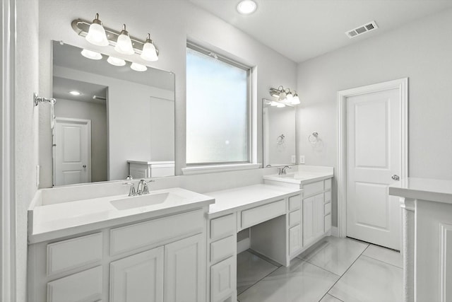 9920 Pikes Peak Pl, Little Elm, TX 75068 - full bath with double vanity, marble finish floors, and recessed lighting