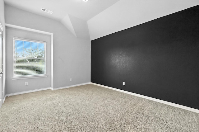 9920 Pikes Peak Pl, Little Elm, TX 75068 - carpeted empty room with baseboards and lofted ceiling
