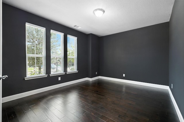 9920 Pikes Peak Pl, Little Elm, TX 75068 - unfurnished room featuring dark wood finished floors