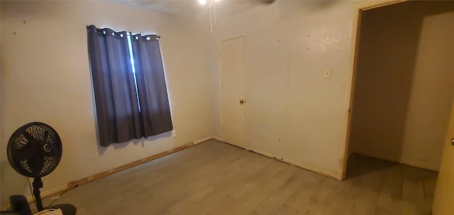 605 N Davis Dr, Arlington, TX 76012 - spare room with light wood-type flooring and baseboards