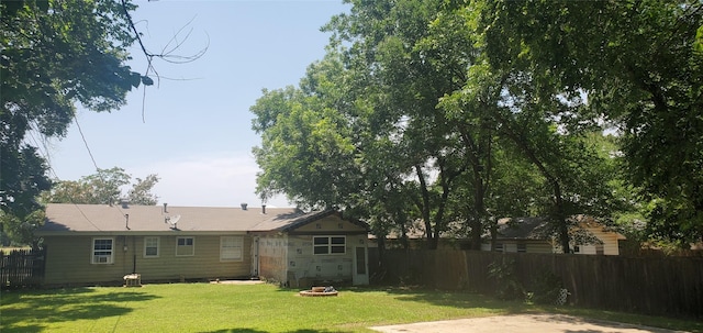605 N Davis Dr, Arlington, TX 76012 - view of yard with a fire pit