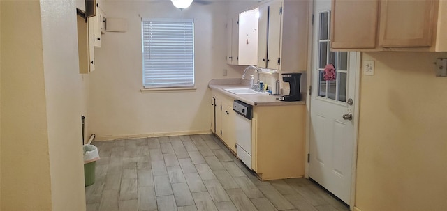 605 N Davis Dr, Arlington, TX 76012 - kitchen with dishwasher, light countertops, and light wood-type flooring