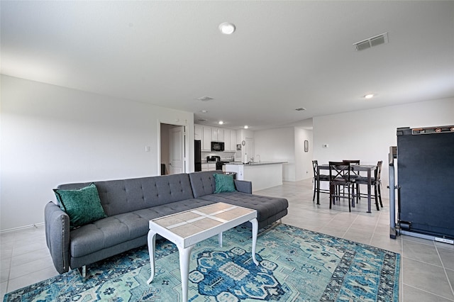 1773 Courage Crk, Crandall, TX 75114 - living room with light tile patterned flooring and recessed lighting