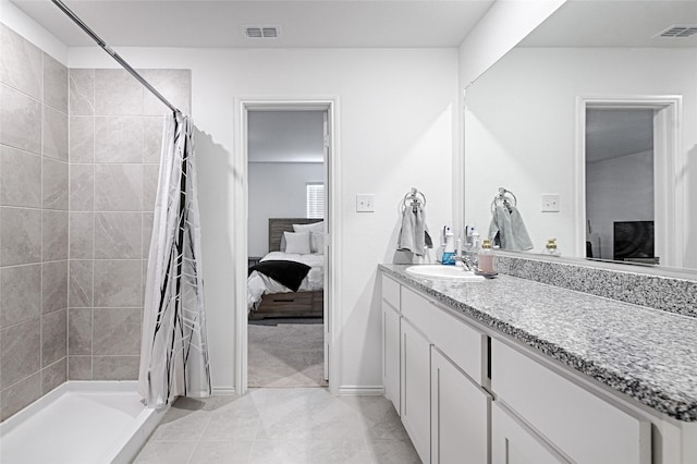 1773 Courage Crk, Crandall, TX 75114 - ensuite bathroom featuring vanity and tiled shower